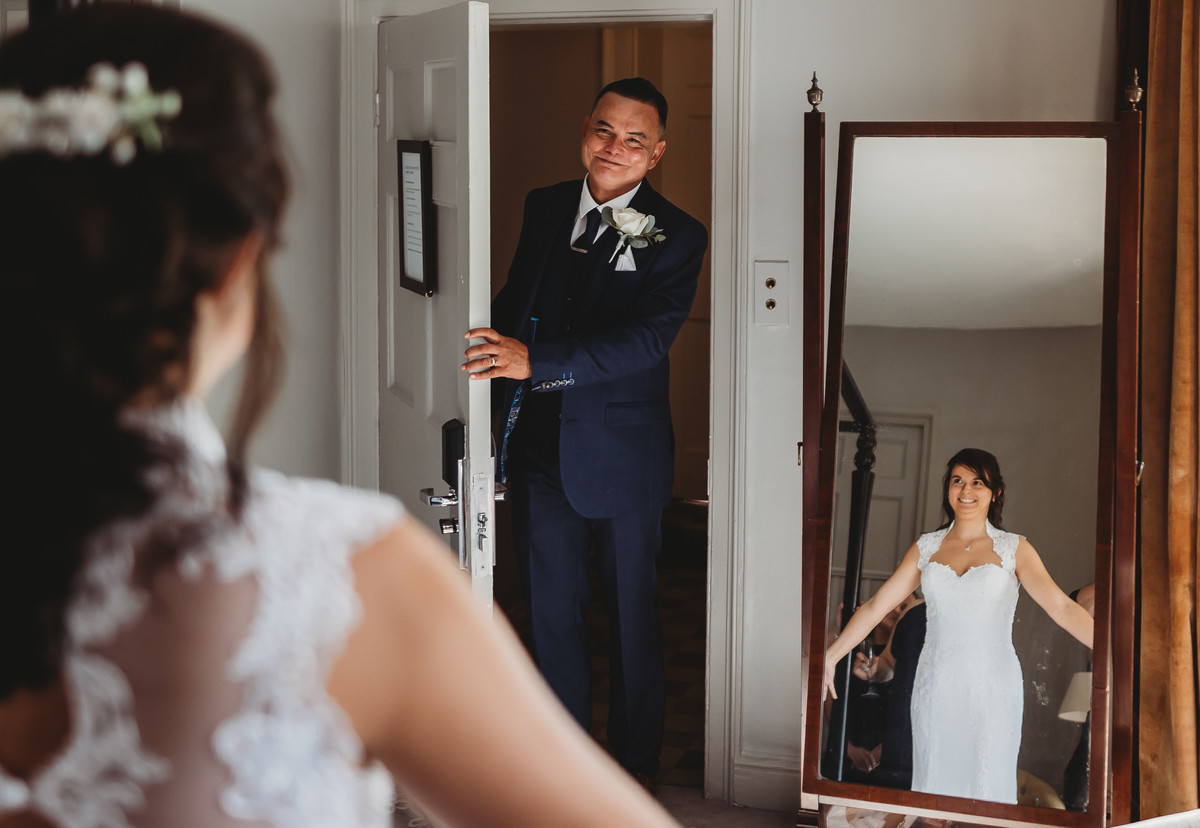 Alternative Berkshire wedding photographer photographing a brides 1st look on her wedding day