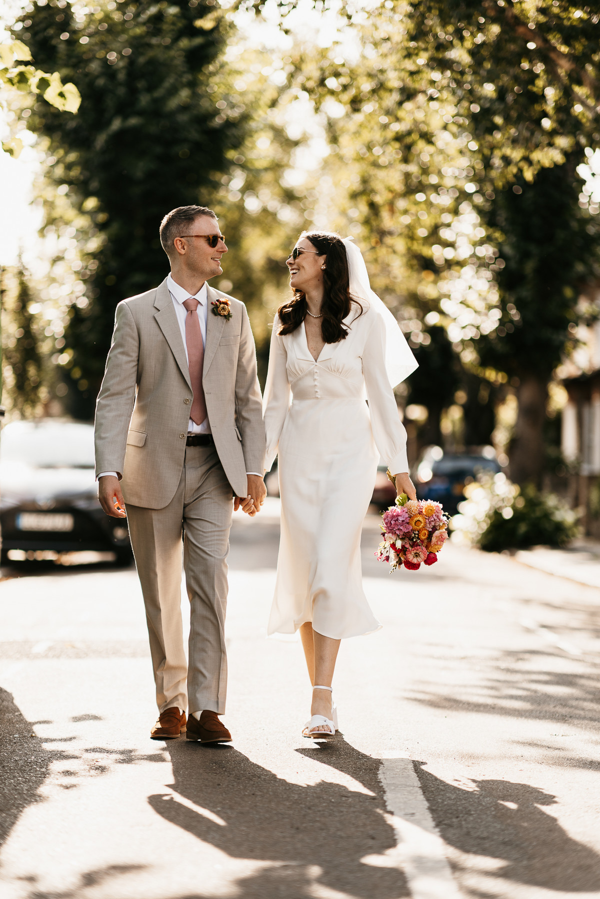 Bride and Groom sharing a candid moment with Berkshire wedding photographer 